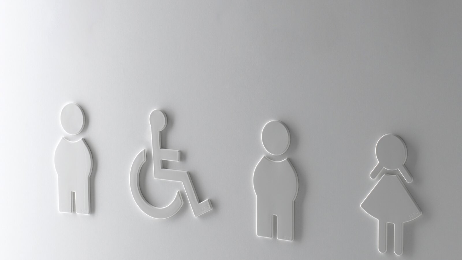 WC symbols man woman and barrier-free in the colour white made of polyamide