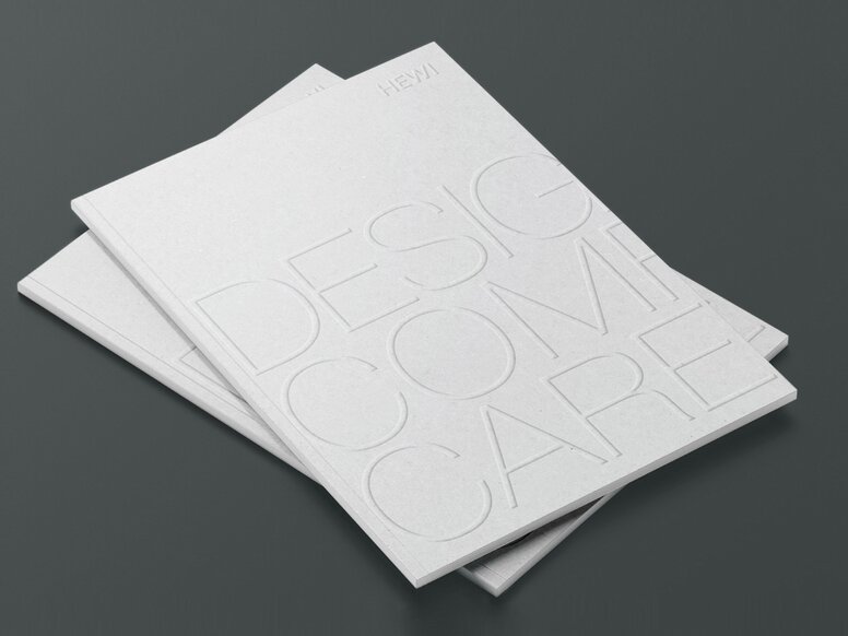 Two stacked Design Comfort Care brochures