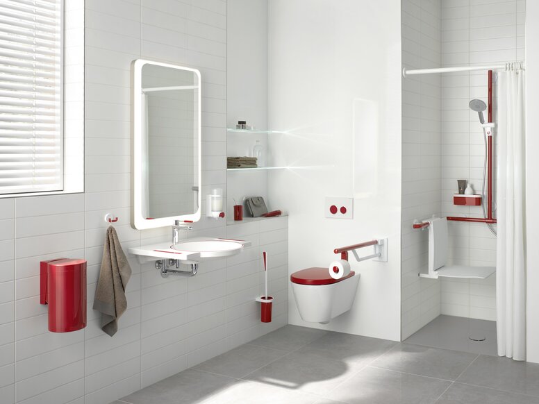 Bathroom equipped with products in a contrasting red colour for dementia patients